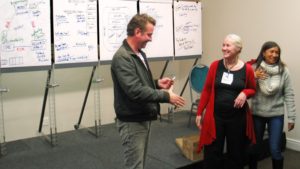 Wedding planner Hannes wins a prize draw at the ProjectManagement.co.za workshop